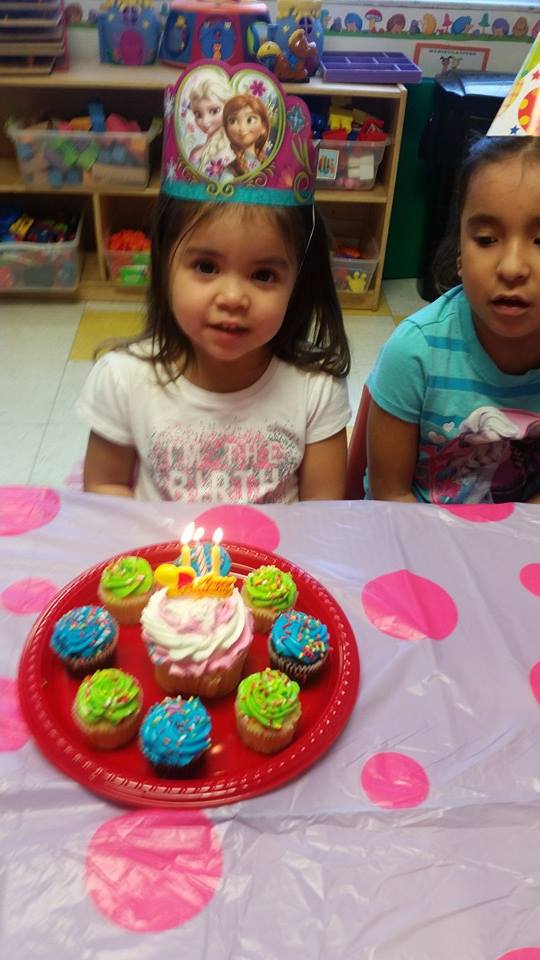 Child with Birthday Cupcakes 2